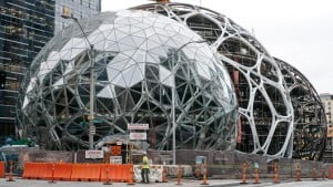 Forget beanbag chairs. Amazon is giving its workers treehouses.