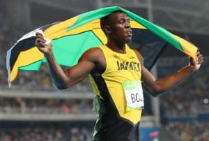 Usain Bolt takes Olympic gold but comes short of breaking own world record
